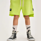 NUNUNU UNBALANCED SWEATSHORTS - HOT LIME