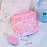 OMG ACCESSORIES COFETTI FLORAL BOW ROUND GLAM BAG